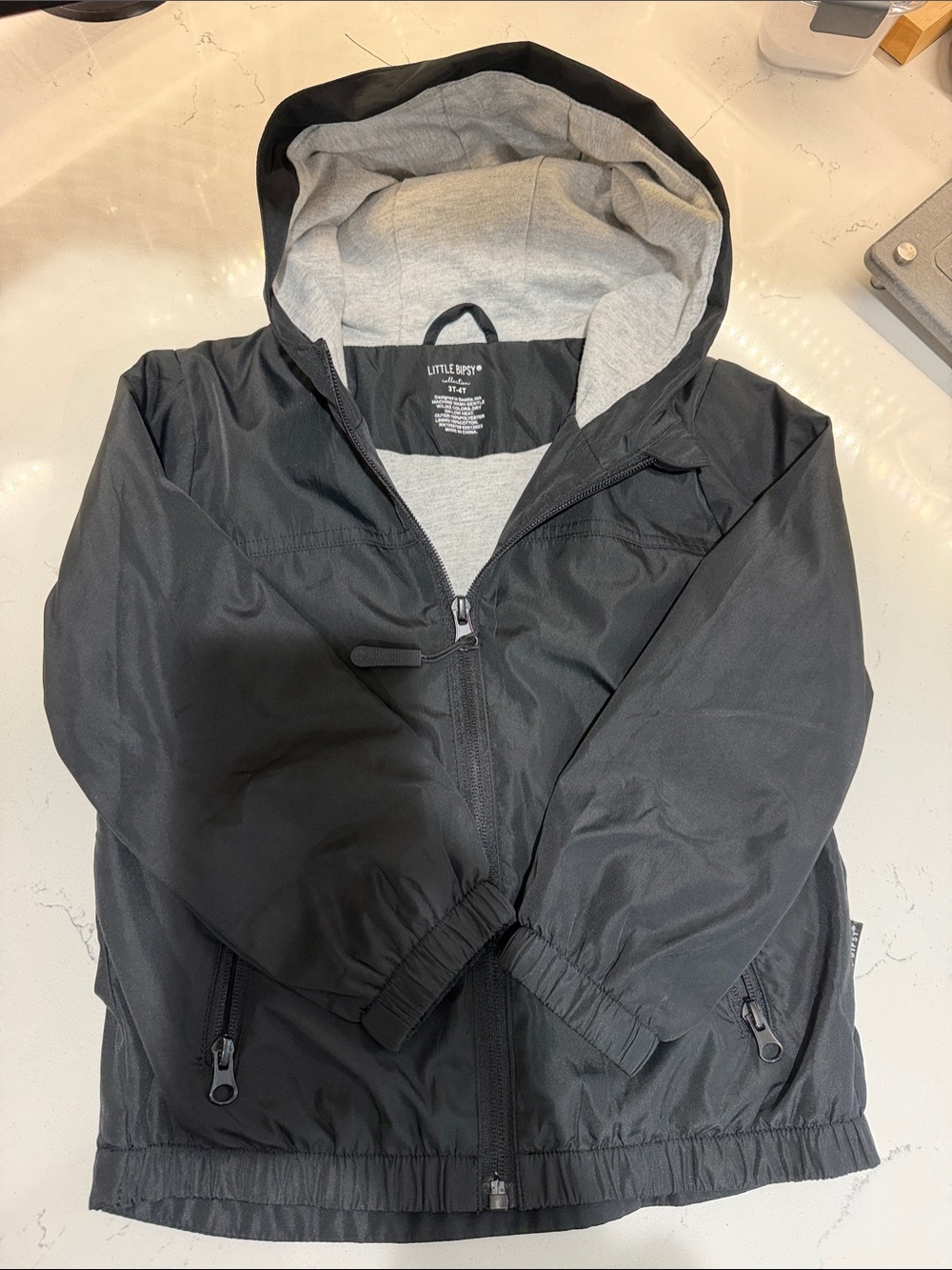 Little Bipsy Black Hooded Jacket with Gray Lining